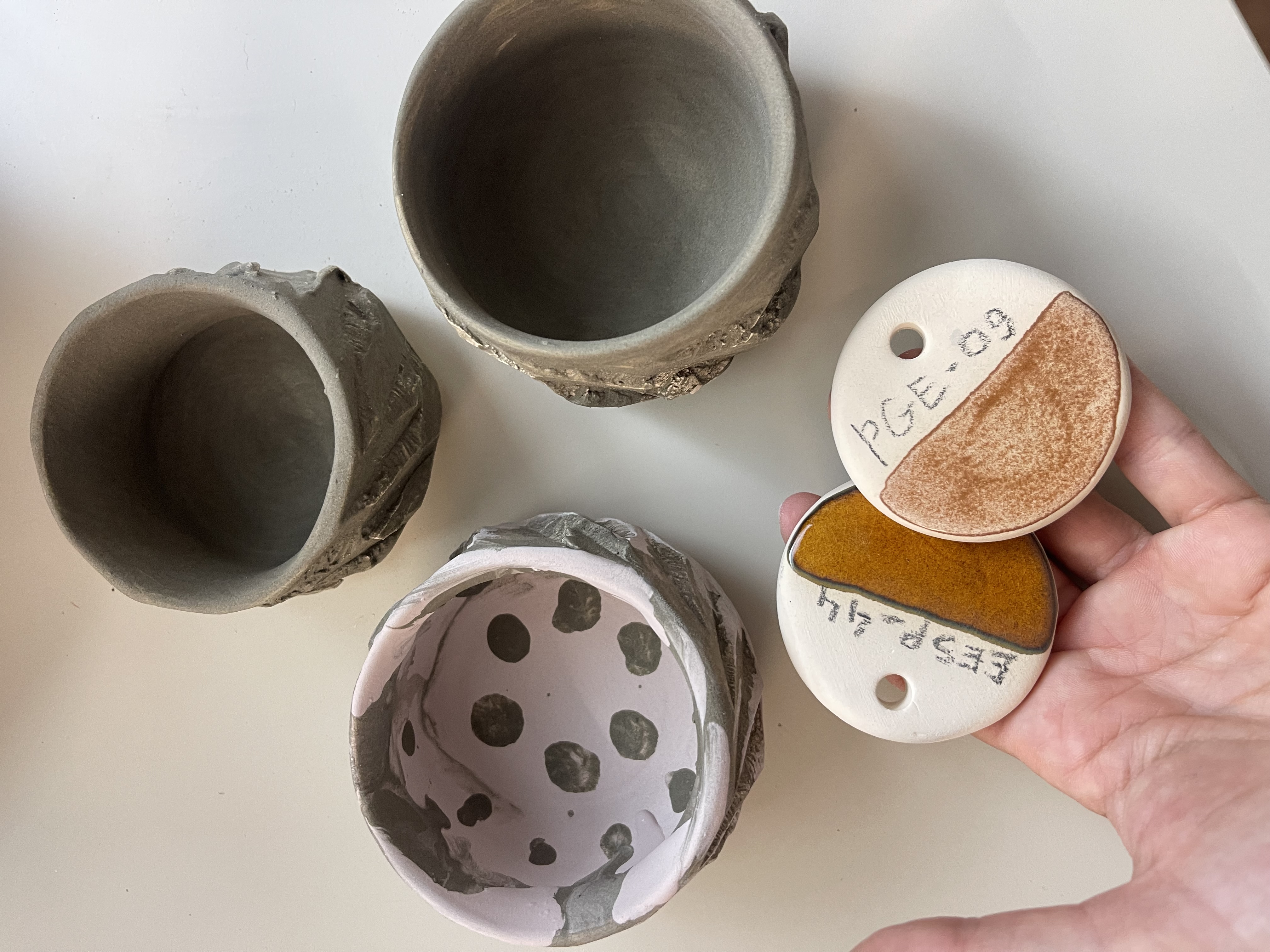 Handmade ceramic pieces and glaze test tiles